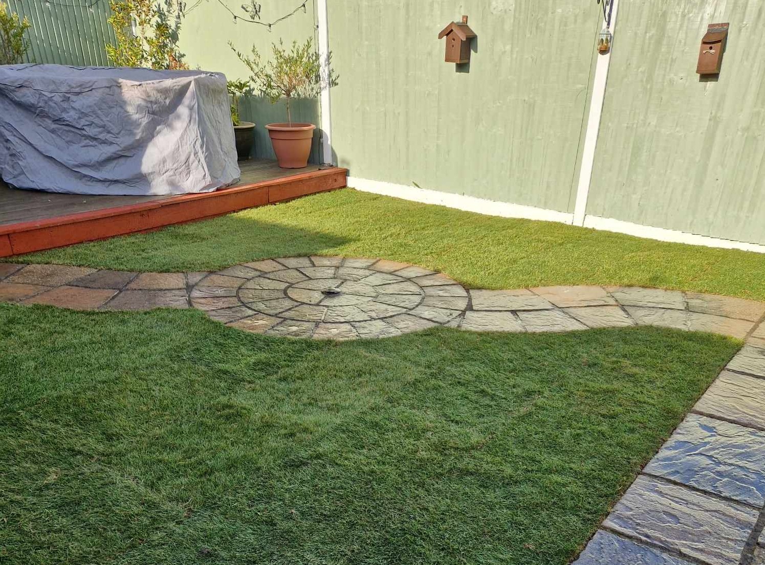 New turf and decorative path and circle