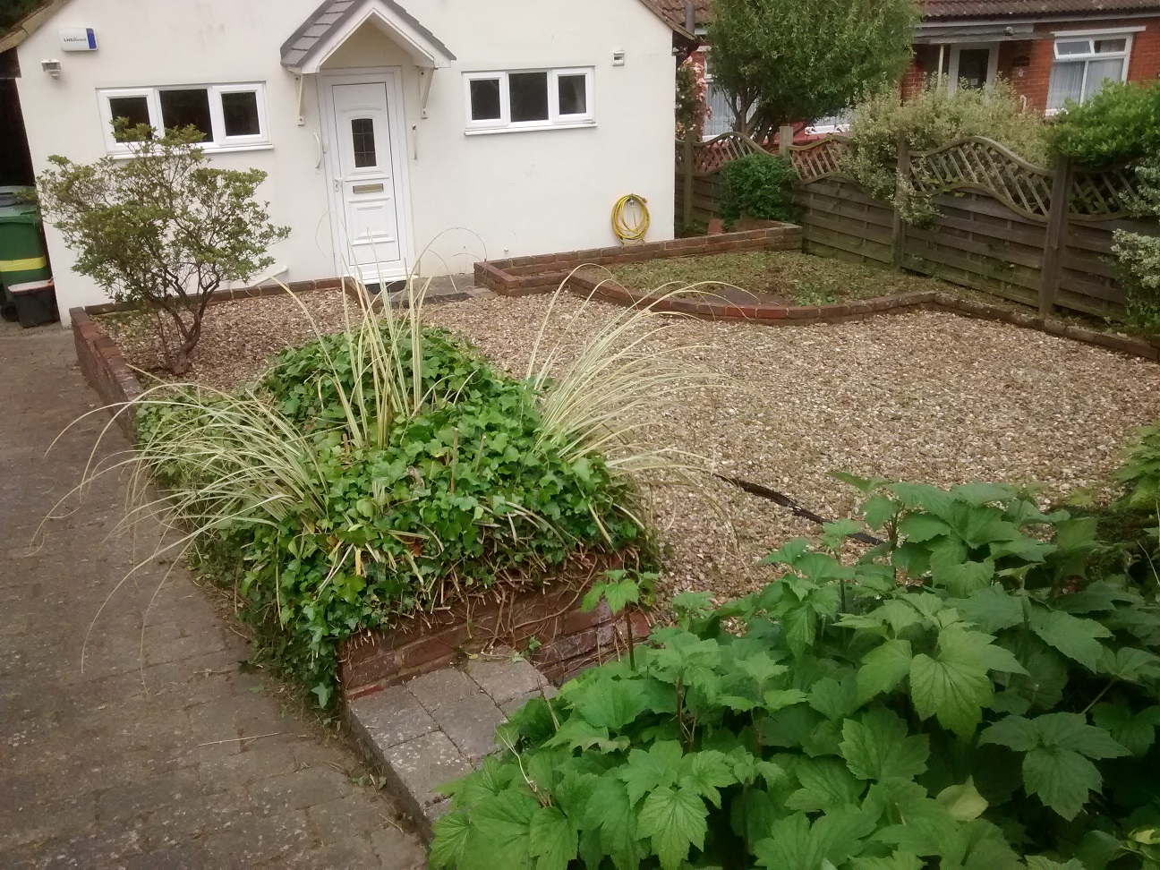 front garden cleared, weeded and hedge-cut